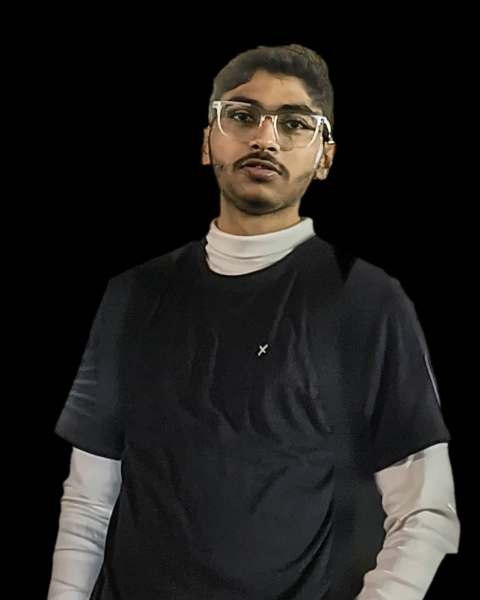 Abhash Chakraborty in glasses, a black T-shirt over a white turtleneck